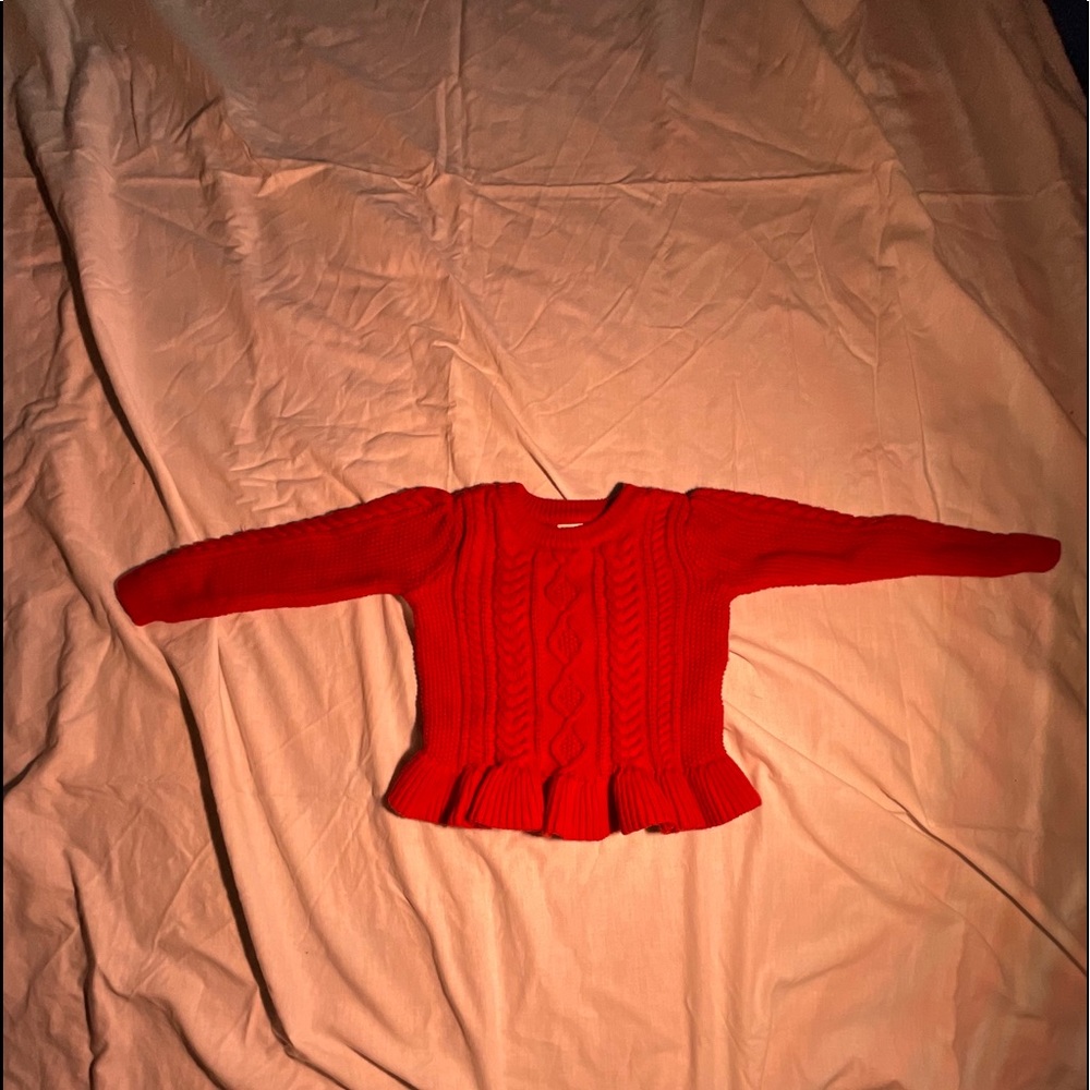 Toddler girl red sweater.
